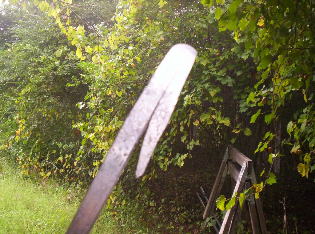 The bend in the stock is welded to itself in this photo, the hook portion stands out below the shaft of the stock.