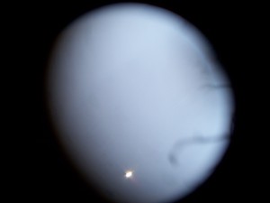 Venus is bright in the telescope eyepiece.