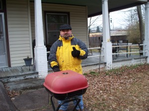 Geof giving a thumbs-up at the grill.