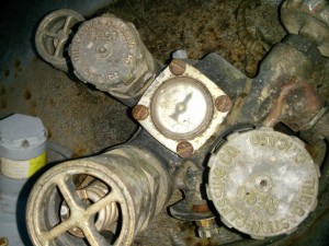 Valve and dials of a propane tank.